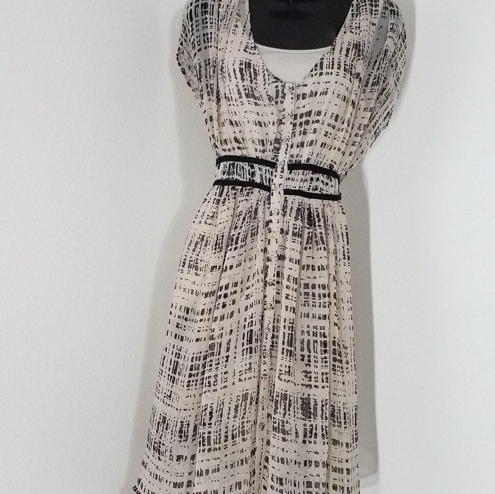 Scandinavian ivory and black knee-length blouse